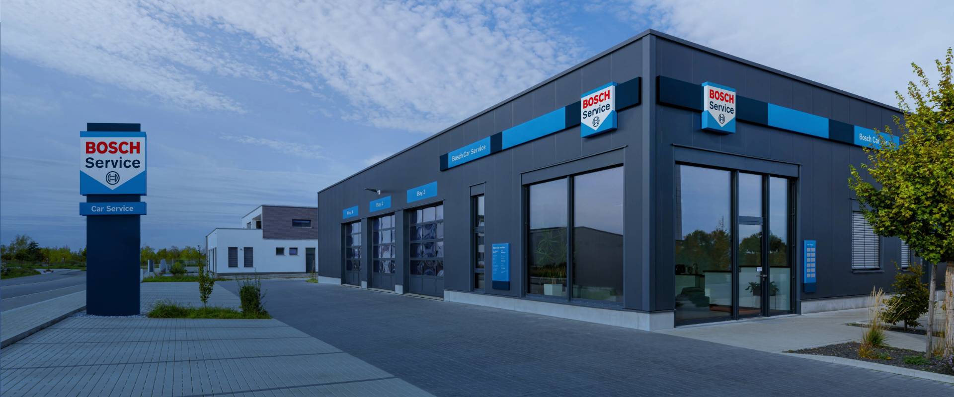 Entré och utsida av en Bosch Car Service verkstad